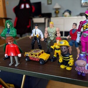 11 Assorted Action Figures and Toy Car Set